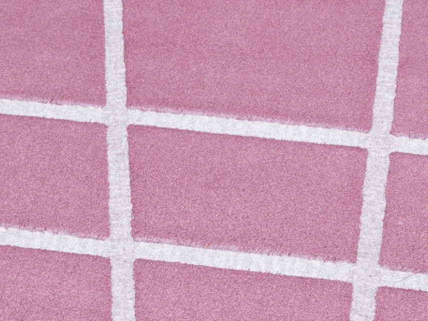 Tappeto rotondo rosa con linee bianche Vivienne di Besana Moquette