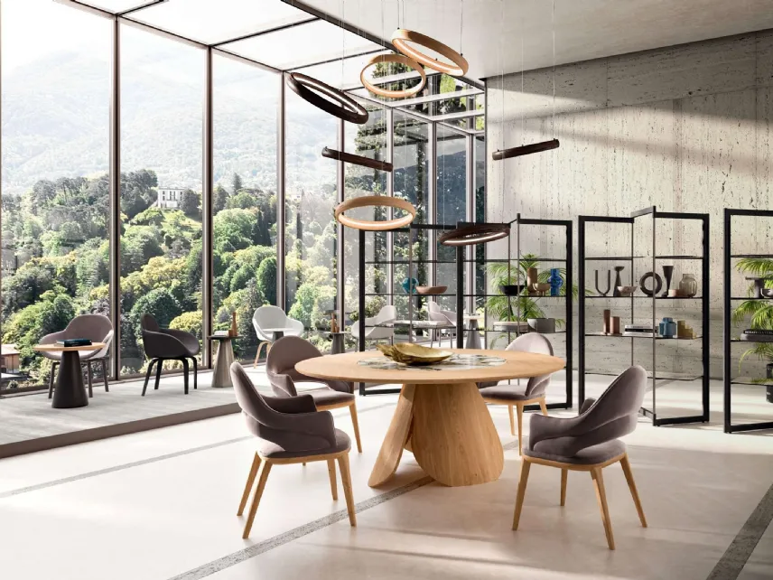 Tavolo rotondo allungabile in legno Veliero con vassoio girevole Lazy Susan in ceramica incassato nel piano di Ozzio
