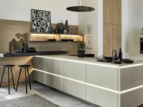 Cucina con penisola Portland Cemento e Rovere di Nolte