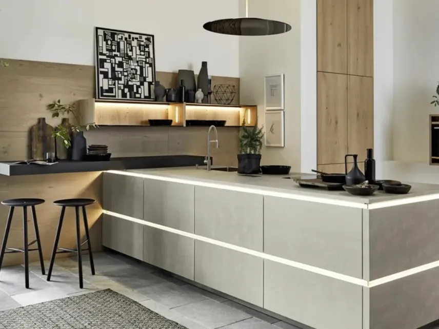 Cucina con penisola Portland Cemento e Rovere di Nolte