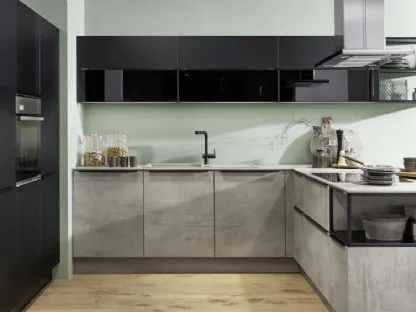 Cucina Moderna ad angolo con penisola Stone Beton Feel e Nero di Nolte